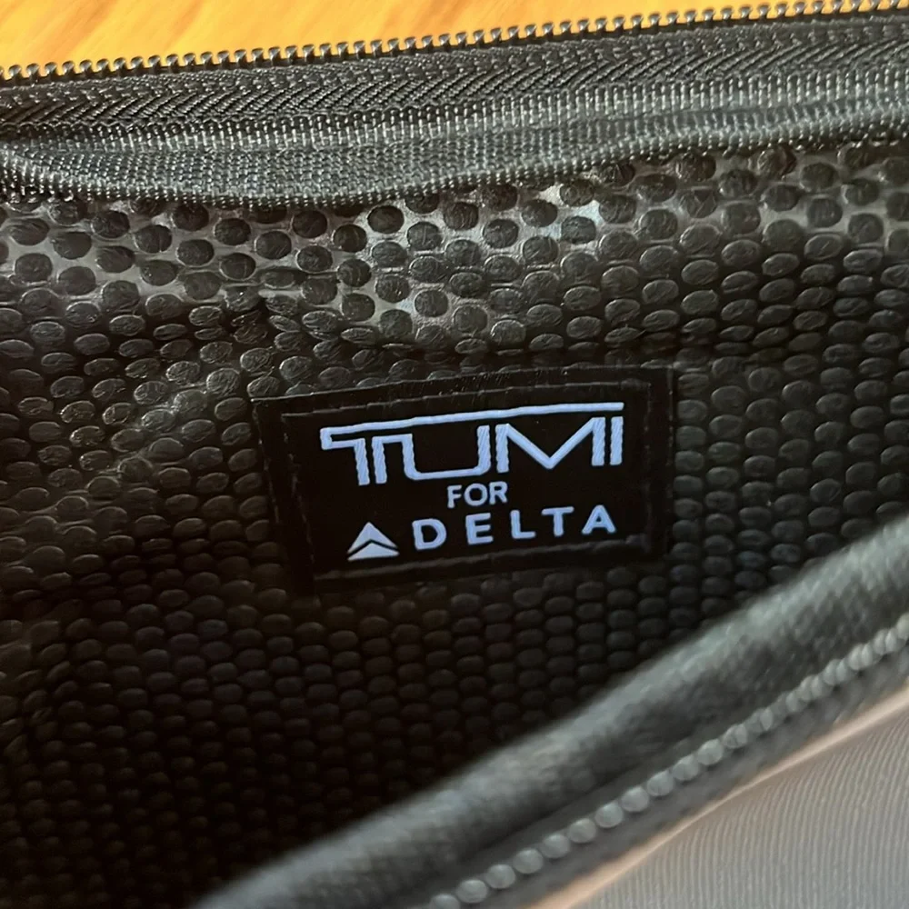 Tumi for Delta two tone grey bag with two sleep masks